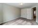 Simple bedroom with neutral walls and carpet flooring at 6280 Culbert St # 190, Harrisburg, NC 28075