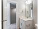 Simple bathroom with single vanity and access to another room at 6280 Culbert St # 190, Harrisburg, NC 28075
