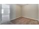 Spacious bedroom with neutral walls and carpeted floor at 6280 Culbert St # 190, Harrisburg, NC 28075