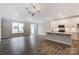 Open floor plan with kitchen, dining, and living areas at 6280 Culbert St # 190, Harrisburg, NC 28075