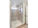 Spacious shower with marble tile and built-in shelves at 6280 Culbert St # 190, Harrisburg, NC 28075