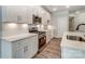 White shaker cabinets, stainless steel appliances and subway tile backsplash at 6280 Culbert St # 190, Harrisburg, NC 28075