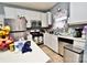 Bright kitchen features stainless steel appliances and an island at 9841 Baxter Caldwell Dr, Charlotte, NC 28213