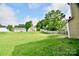 Large backyard with grassy area, providing ample outdoor space at 9841 Baxter Caldwell Dr, Charlotte, NC 28213