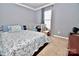 Bedroom with a double bed and crib at 9841 Baxter Caldwell Dr, Charlotte, NC 28213