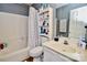 Small bathroom with a tub, toilet and vanity at 9841 Baxter Caldwell Dr, Charlotte, NC 28213