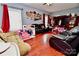 Spacious living room with hardwood floors and comfy seating at 9841 Baxter Caldwell Dr, Charlotte, NC 28213