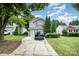 House exterior with driveway and landscaping at 1820 Oakdale Green Dr, Charlotte, NC 28216