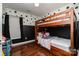 Bedroom with bunk bed and polka dot wall at 1820 Oakdale Green Dr, Charlotte, NC 28216