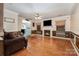 Living room with hardwood floors and fireplace at 1820 Oakdale Green Dr, Charlotte, NC 28216