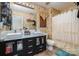 Bathroom with double vanity and shower/tub at 1820 Oakdale Green Dr, Charlotte, NC 28216