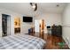 Main bedroom with hardwood floors and en-suite bathroom at 1820 Oakdale Green Dr, Charlotte, NC 28216