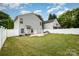 Large backyard with a grassy lawn at 1820 Oakdale Green Dr, Charlotte, NC 28216