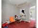 Small office space with a desk and chair at 1820 Oakdale Green Dr, Charlotte, NC 28216