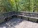 Deck with built-in benches overlooking a wooded area at 2819 Royal Ridge Ln, Charlotte, NC 28212