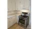Bright kitchen with white cabinets, stainless steel appliances, and granite countertops at 2819 Royal Ridge Ln, Charlotte, NC 28212
