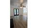 Living room features hardwood floors, a fireplace, and access to a deck at 2819 Royal Ridge Ln, Charlotte, NC 28212