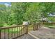 Wooden deck overlooking a wooded backyard at 2115 Dallas Stanley Hwy, Stanley, NC 28164