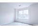 Bright bedroom with large window and hardwood floors at 12914 Mosby Ln, Charlotte, NC 28273