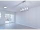 Spacious dining room with hardwood floors and a sliding glass door leading to the backyard at 12914 Mosby Ln, Charlotte, NC 28273