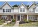 Two story townhome with gray and white exterior at 12914 Mosby Ln, Charlotte, NC 28273