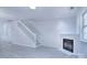Living room with fireplace, hardwood floors and staircase at 12914 Mosby Ln, Charlotte, NC 28273