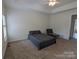 Large main bedroom with carpeted floors and plenty of natural light at 5916 Meadowmere Dr, Monroe, NC 28110