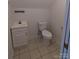 Small bathroom with toilet and vanity at 5916 Meadowmere Dr, Monroe, NC 28110