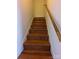 Wooden staircase leading to upper level at 5916 Meadowmere Dr, Monroe, NC 28110