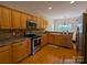 Kitchen with stainless steel appliances and hardwood floors at 5916 Meadowmere Dr, Monroe, NC 28110
