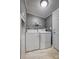 Laundry room with side-by-side washer and dryer, and tile flooring at 707 Cool Spring Rd, Statesville, NC 28625