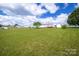 Large backyard with a slightly elevated view of the surrounding landscape at 707 Cool Spring Rd, Statesville, NC 28625