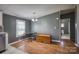 Cozy dining area with wood-look floors and a view into the bathroom at 707 Cool Spring Rd, Statesville, NC 28625