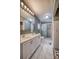 Updated bathroom with double vanity, tile flooring, and a walk-in shower at 707 Cool Spring Rd, Statesville, NC 28625