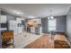 Modern kitchen featuring white cabinets, stainless steel appliances, and tile flooring at 707 Cool Spring Rd, Statesville, NC 28625