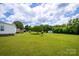 Large backyard with a shed and mature trees at 707 Cool Spring Rd, Statesville, NC 28625