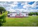 Front view of the house with a yard at 707 Cool Spring Rd, Statesville, NC 28625