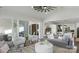Bright living room with vaulted ceiling, fireplace and sunroom access at 3314 Lakeside Dr, Charlotte, NC 28270