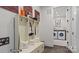 Convenient laundry room with washer, dryer, and built-in storage at 3314 Lakeside Dr, Charlotte, NC 28270