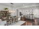 Open dining room and kitchen with large island at 3314 Lakeside Dr, Charlotte, NC 28270