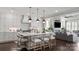 Open kitchen with island and view into living room and dining area at 3314 Lakeside Dr, Charlotte, NC 28270