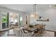 Dining room with sliding glass doors leading to covered patio at 3314 Lakeside Dr, Charlotte, NC 28270