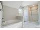 Bathroom with soaking tub and separate shower stall at 11515 Valley Oaks Ln, Stanfield, NC 28163