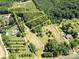 Aerial view of two lots of land with surrounding houses at 10910 Archer Rd, Davidson, NC 28036