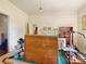 Another view of the living room, showing a pool table and shelving at 10910 Archer Rd, Davidson, NC 28036