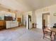 Another view of the kitchen showing a sink and dining area at 10910 Archer Rd, Davidson, NC 28036