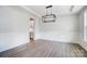 Spacious dining room featuring hardwood floors and a modern chandelier at 2016 Cedar Falls Dr # 7, Waxhaw, NC 28173