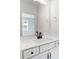 Bathroom vanity with white cabinets and quartz countertop at 2016 Cedar Falls Dr # 7, Waxhaw, NC 28173