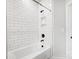 Clean white tiled shower with built-in niche at 2016 Cedar Falls Dr # 7, Waxhaw, NC 28173