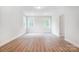 Spacious bonus room with hardwood floors and two windows at 2016 Cedar Falls Dr # 7, Waxhaw, NC 28173